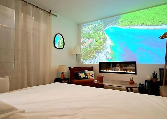 Сasa de vacaciones Le Patio - Cinélodge Avec Jardin